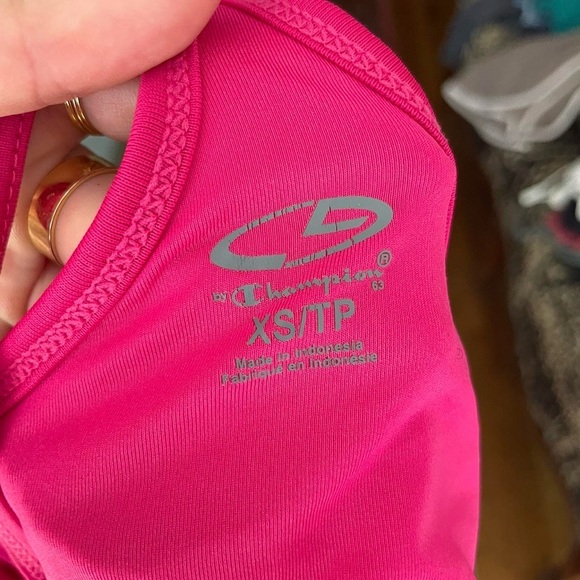 Hot pink champion tank top 
Has a built in bra and adjustable bottom - Picture 5 of 5